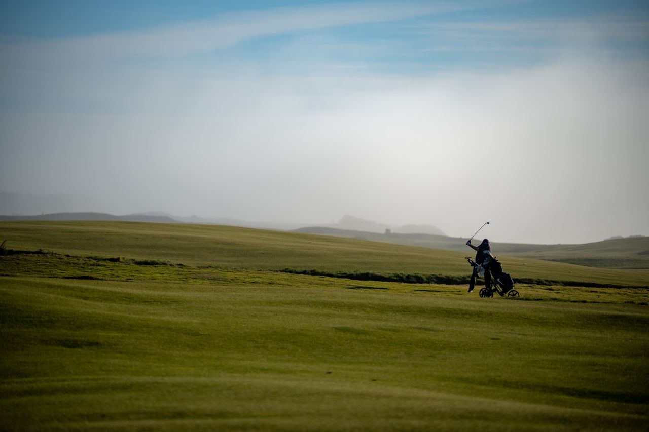 golfer in distance on course
